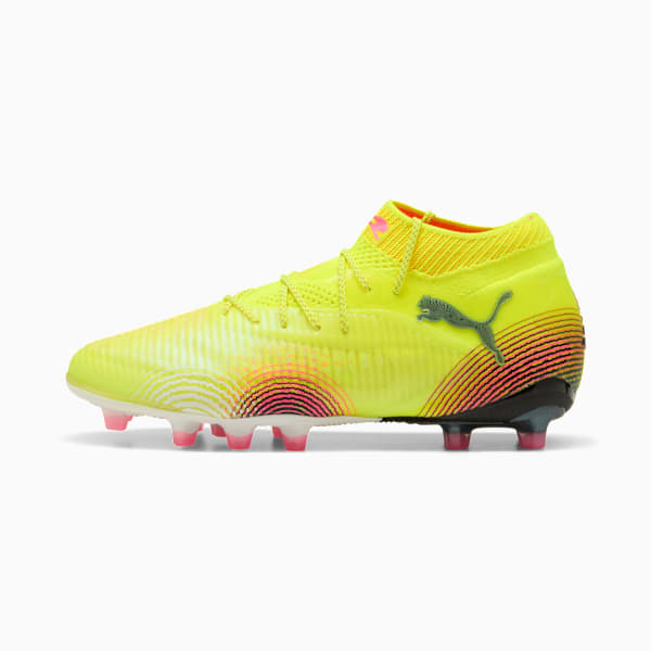 Yellow PUMA football boot with a high-top collar and pink-tipped studs.