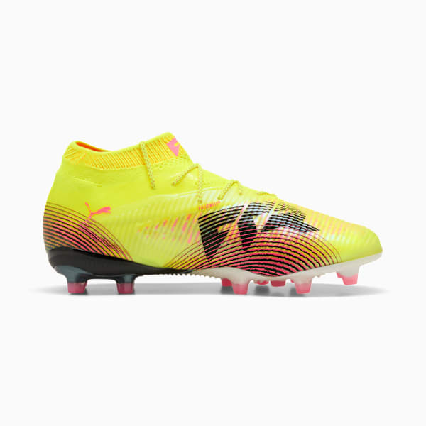Yellow PUMA football boot with pink and black details for adults.