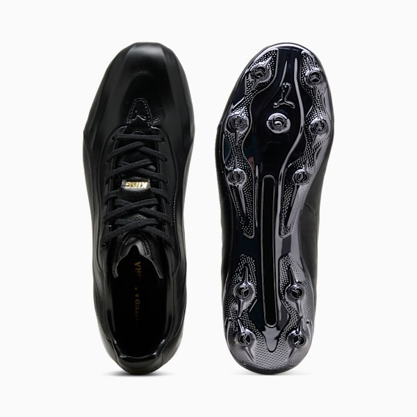 Black PUMA football boots for adults, shown with laces and studded soles.