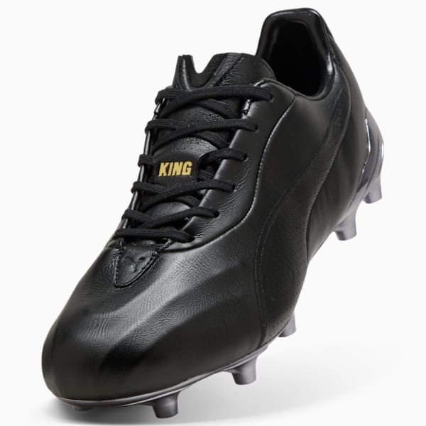 Black PUMA KING football boot featuring laces and a gold 'KING' logo.