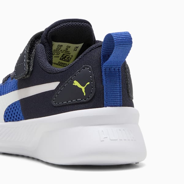 Blue PUMA trainer for kids with white stripe and hook-and-loop fastener.