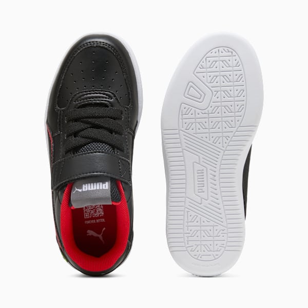 Black PUMA trainer for kids with laces and hook-and-loop strap, showing the sole.