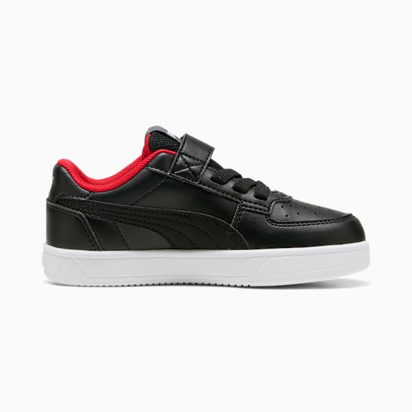 Black PUMA child's trainer with a hook-and-loop strap and red inner lining.