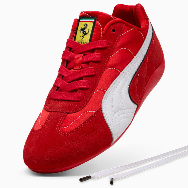 Red PUMA men's shoe with a white stripe, laces, and Ferrari logo detail.