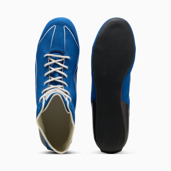 Blue PUMA unisex shoe with white laces and thin sole, shown from above and sole.