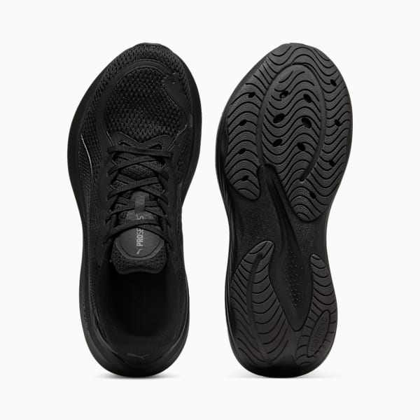 Black PUMA running trainers, for adults, showing the upper and patterned sole.
