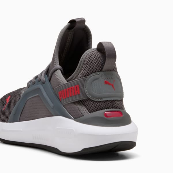 Grey PUMA trainer for adults, featuring a white sole and red logo accents.