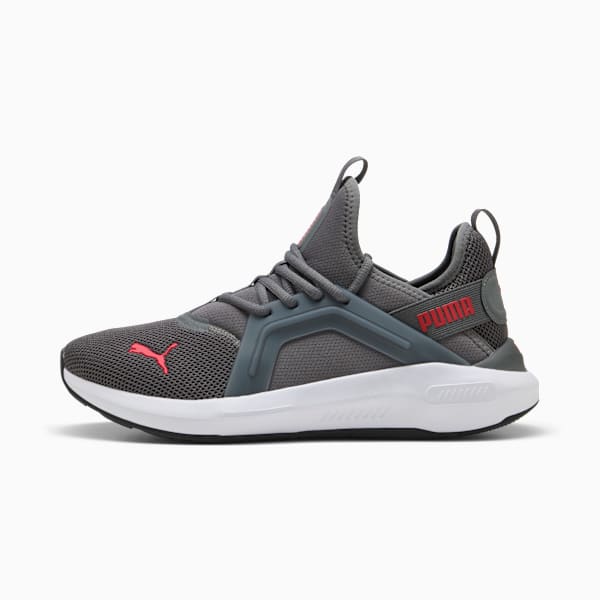 Grey PUMA unisex shoe with a white sole and red logo detail.