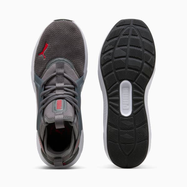 Grey PUMA trainers for adults, showcasing a mesh upper and patterned sole.
