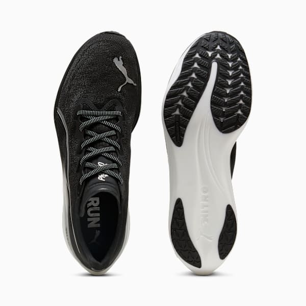 Black PUMA running trainers with patterned laces and a white and black sole.