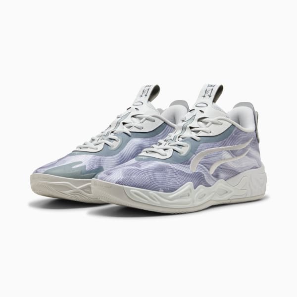 Grey PUMA trainers feature wave pattern, lace-up closure, and textured sole.