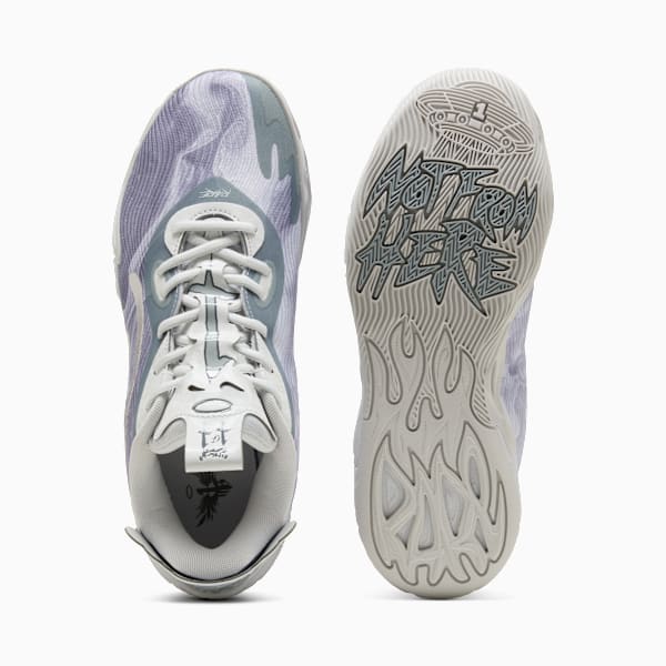 Grey PUMA trainers feature a patterned upper and detailed sole for adults.
