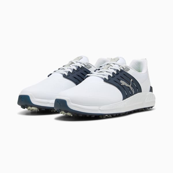 White PUMA golf shoes, designed for adults, with a patterned sole and lace-up fastening.
