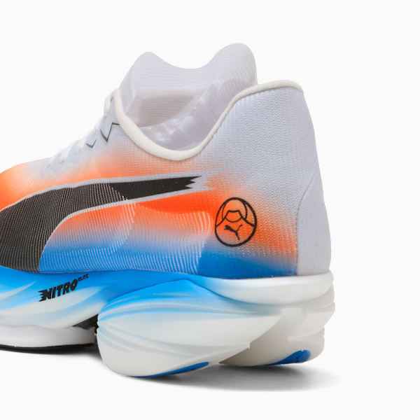 White PUMA running shoe featuring orange, blue accents and a black logo.