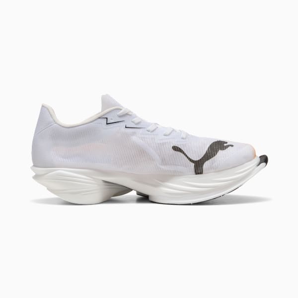 White PUMA unisex shoe with a layered sole and black logo detail.