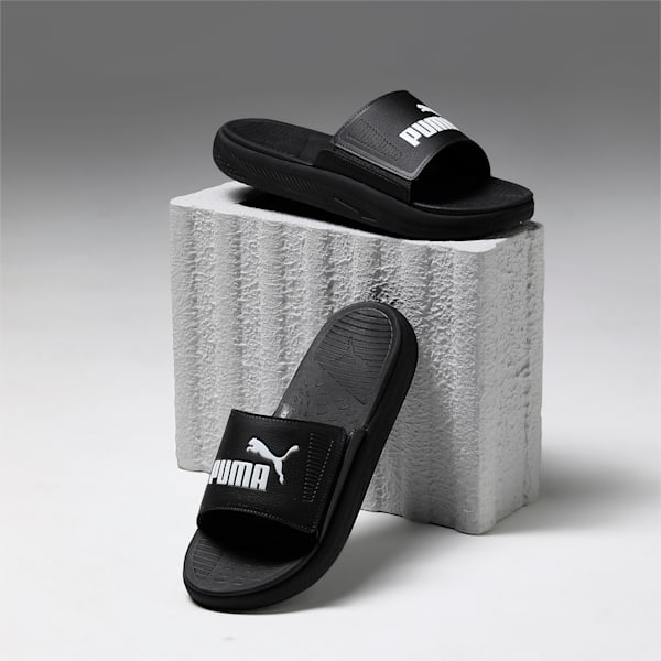 Puma black and white slides on sale
