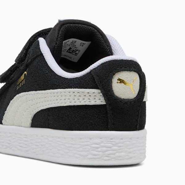 Black PUMA toddler shoe with white stripe and touch-close fastening.