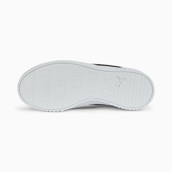 White PUMA trainer sole, showing grip pattern and logo, for adults.
