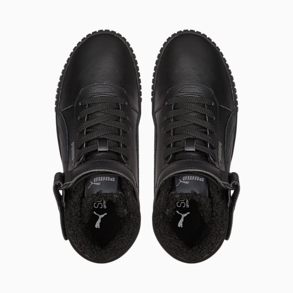 Top-down view of black PUMA trainers with lace-up closure and fluffy lining.