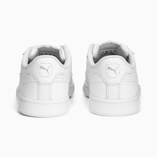 White PUMA trainer (child) with touch-fastening strap and logo on the heel.