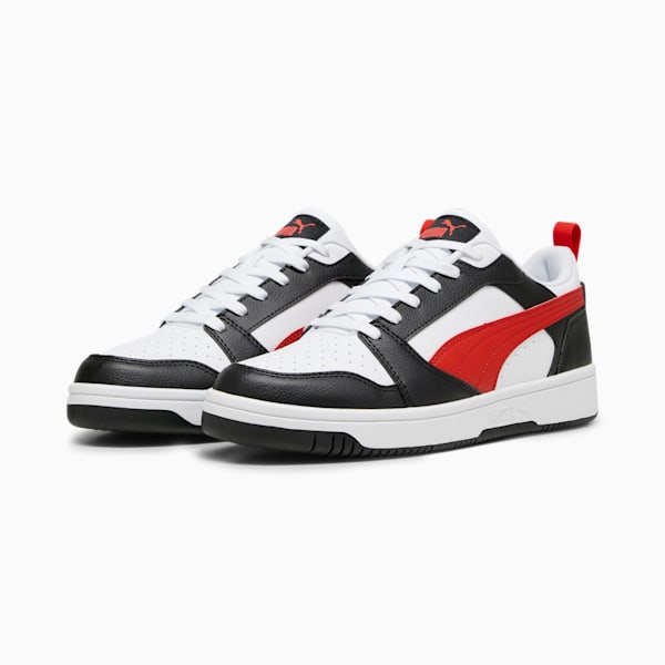 White, black and red PUMA trainer with lace-up closure for adults.