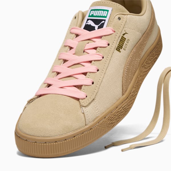 Pink pumas with gold writing on sale