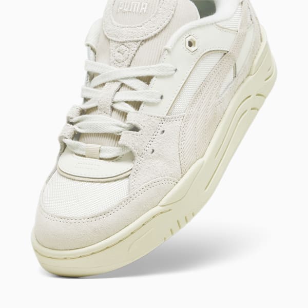 PUMA 180 sneakers in chalk and brown with rubber sole