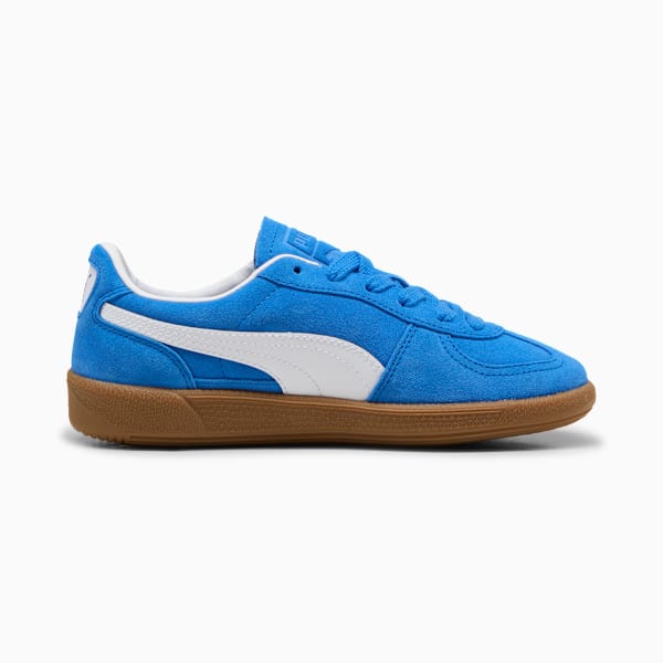 Blue PUMA trainer for adults, featuring white stripes and a brown sole.