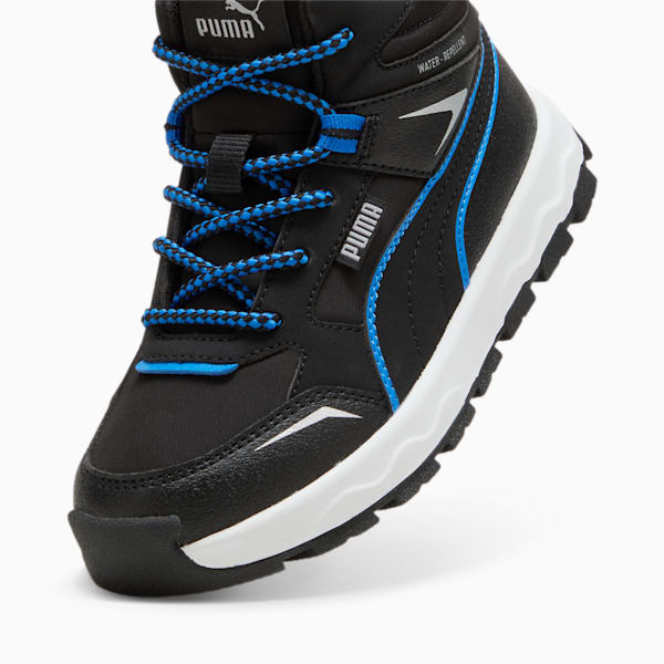 Black PUMA boot for kids with blue laces and a white sole unit.