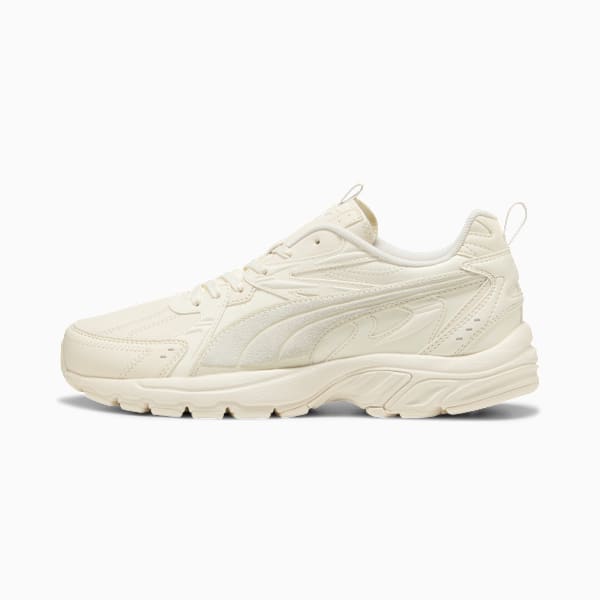 Cream PUMA unisex trainer with a textured sole and signature side stripe.