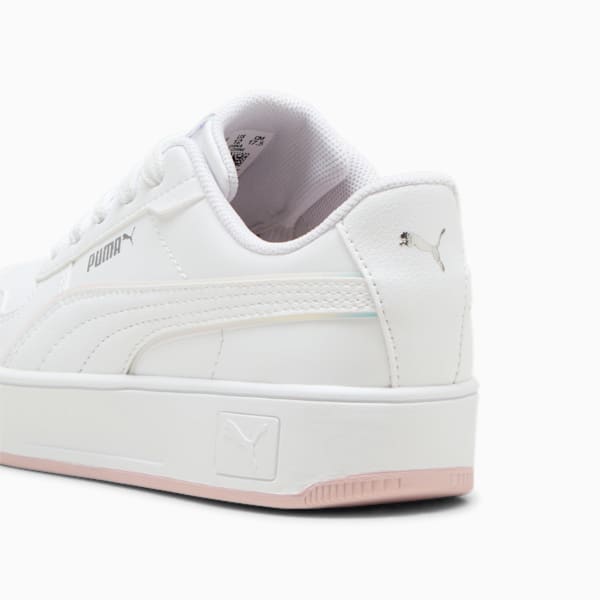 White PUMA trainer for women, with pink sole trim and logo details.