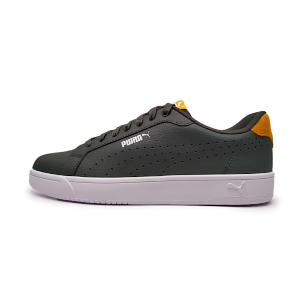 Green PUMA trainer with white sole and logo for adults.