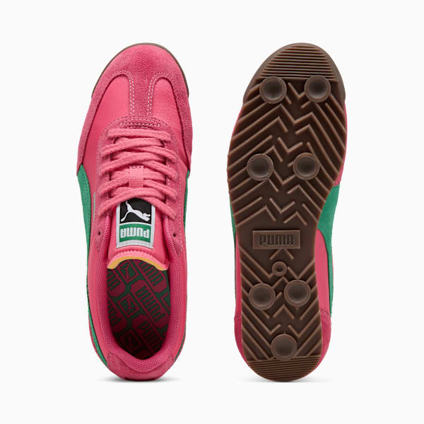 Pink PUMA Roma women's trainers with lace-up closure and brown rubber sole.