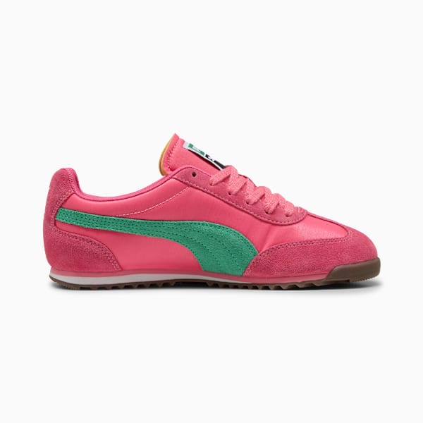 Pink PUMA trainer with green stripe detailing, for youth.