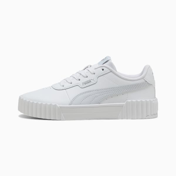 White PUMA trainer for women, featuring a wavy sole and lace-up design.