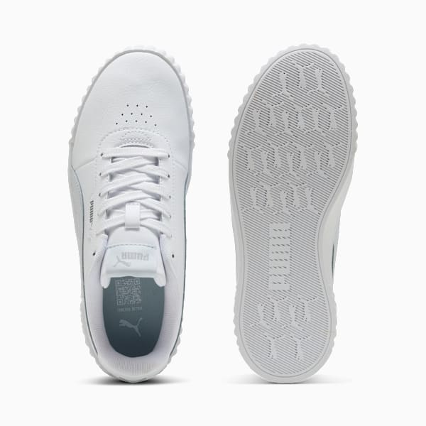 White PUMA ladies' trainer with lace-up closure and patterned sole.