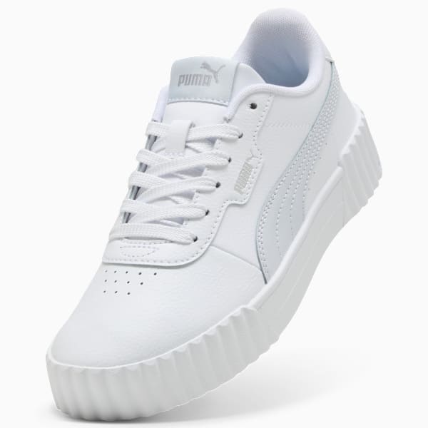 White PUMA trainer with lace-up closure and a ridged sole for women.
