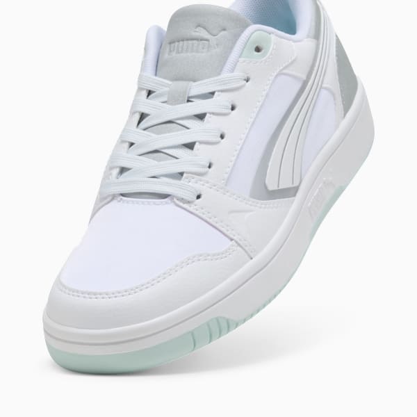 White PUMA trainer with lace-up closure and signature side stripe detail.