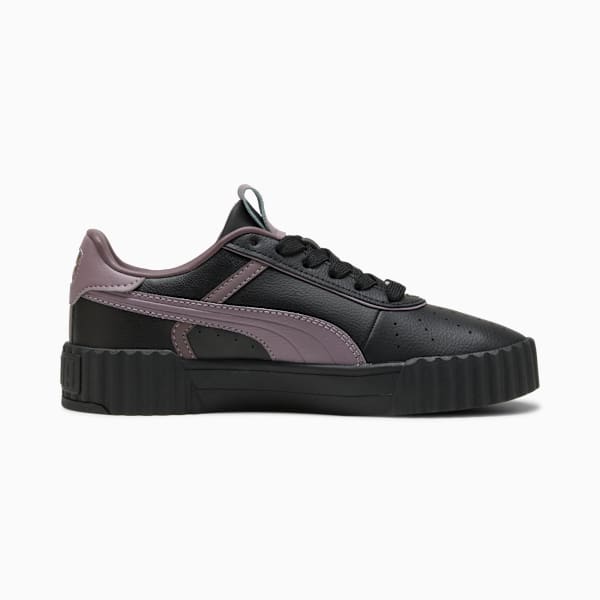 Black PUMA trainer, women's, featuring a lilac formstrip and a chunky sole.