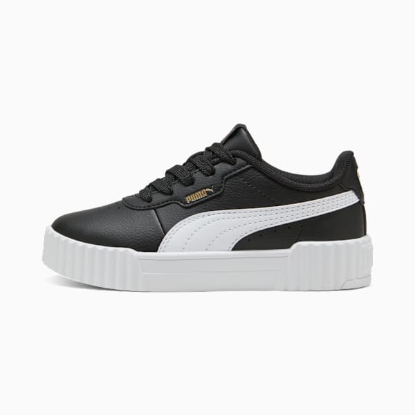 Black PUMA trainer for youth, with white stripe and thick white sole.