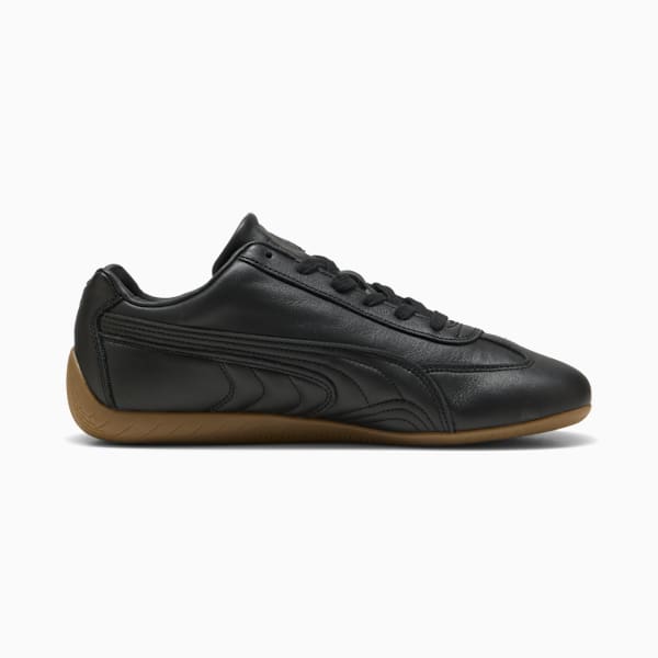 Black PUMA shoe for adults with a gum sole and lace-up closure.