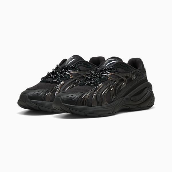 Black PUMA trainers with a mesh upper and glossy, curved overlays for adults.