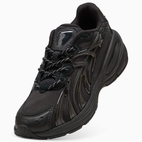 Black PUMA trainers with glossy overlays and patterned laces, for adults.