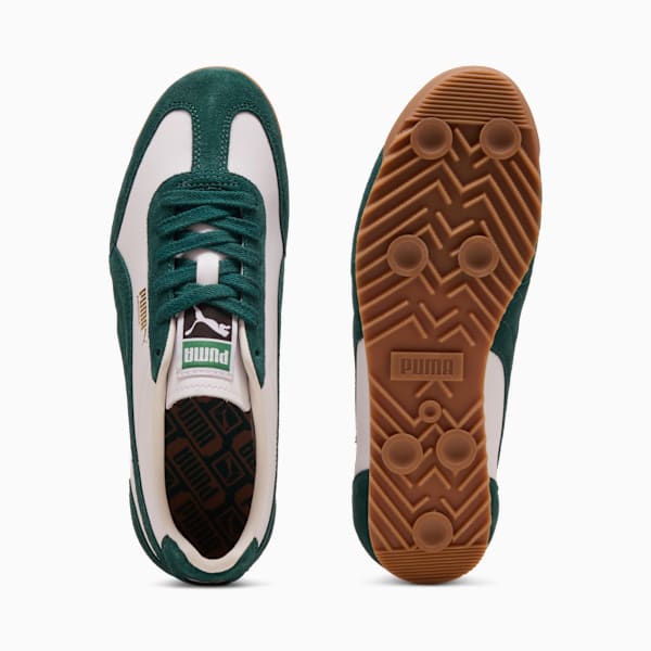 Green PUMA men's shoe with lace-up closure and patterned brown sole.
