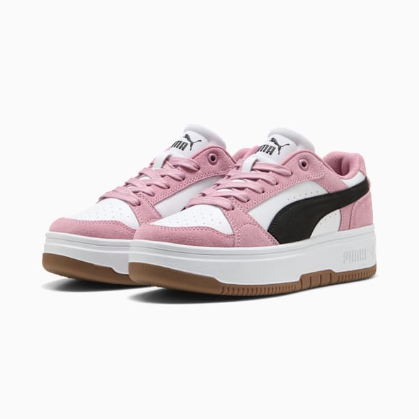 Pink PUMA trainers for women, featuring suede accents, a black stripe, and a platform sole.