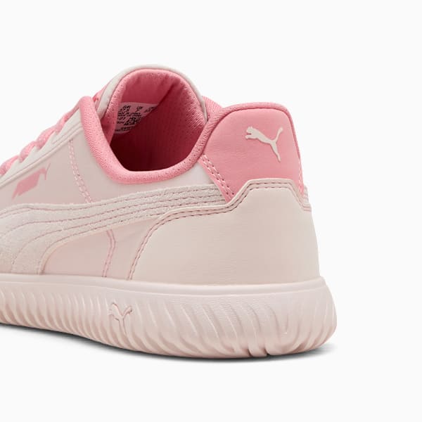 Pink PUMA trainer for women, featuring a textured sole and the brand's logo.