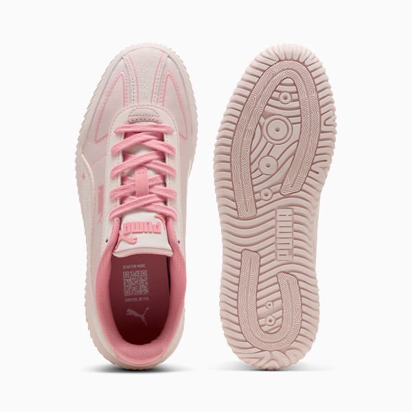Pink PUMA women's trainer showing laces and sole with grip pattern.