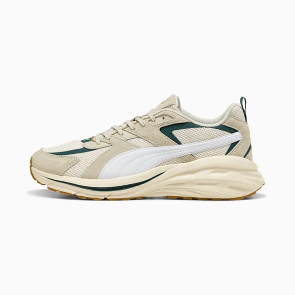 Beige PUMA men's sneaker with white formstrip and wavy sole design.