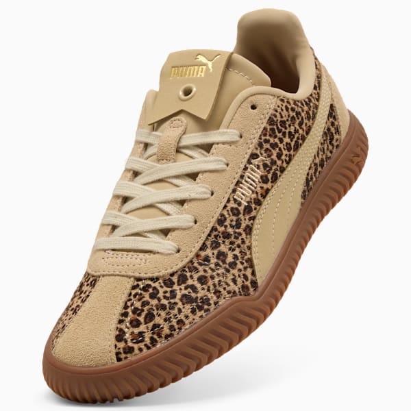 Beige PUMA trainer with leopard print and lace-up fastening.