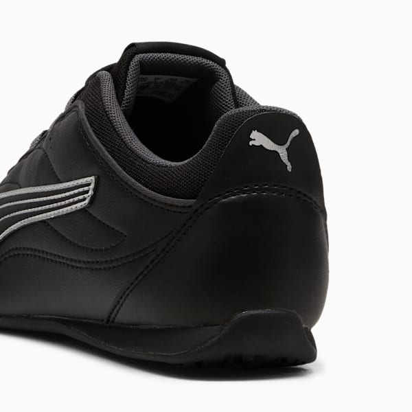 Black PUMA trainer, rear view, with silver logo and stripe detailing for adults.